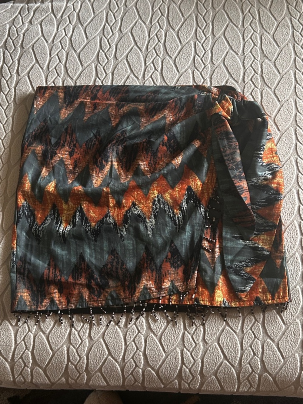 Micas Size M Print WeapMini Skirt with Side Tie in Orange,Teal,and Black